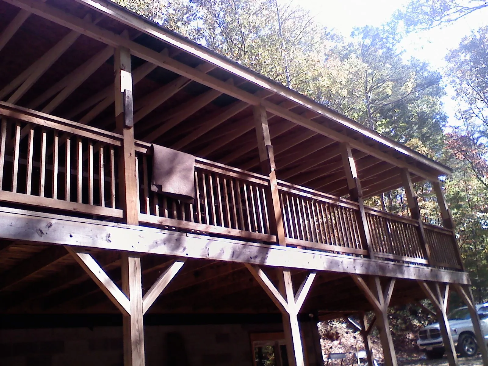 Timber framing under a new elevated porch and deck — Roof Leak Repair in Harrisburg by Roofing Brothers